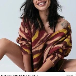 FREE PEOPLE Primrose Animal Print sweater size Small wool blend tunic
